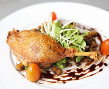 Canard à l'orange et aux tomates