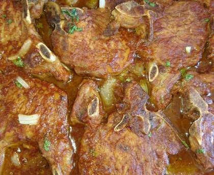 Côte de porc à la sauce tomate
