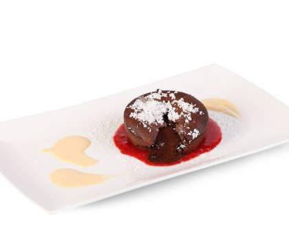 Fondant au chocolat et coulis de framboise