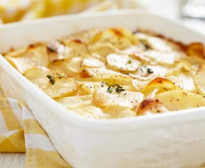 Gratin de pommes de terres à la creme fraiche et fromage fondu