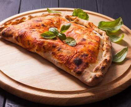 Pizza Calzone au jambon et champignons