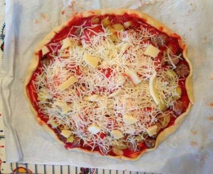 Pizza pomme de terre/chair à saucisse