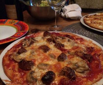 Pizza reine aux merguez