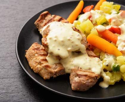 Rôti de porc à la crème à la moutarde