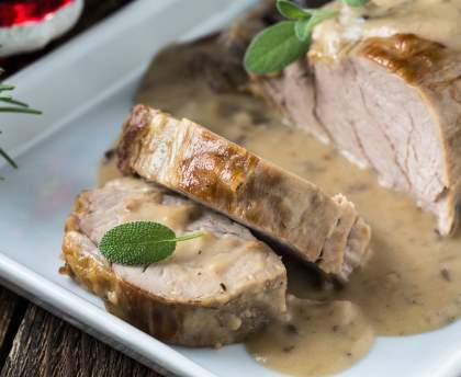 Rôti de porc aux champignons frais sauce moutarde
