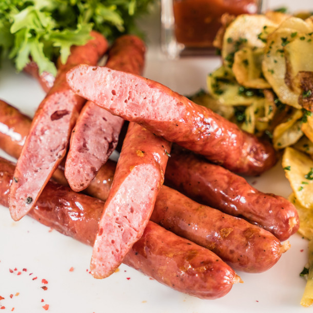 Saucisses de canard confites