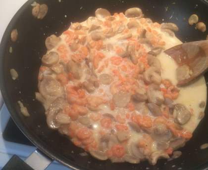 Sauté de crevettes aux champignons