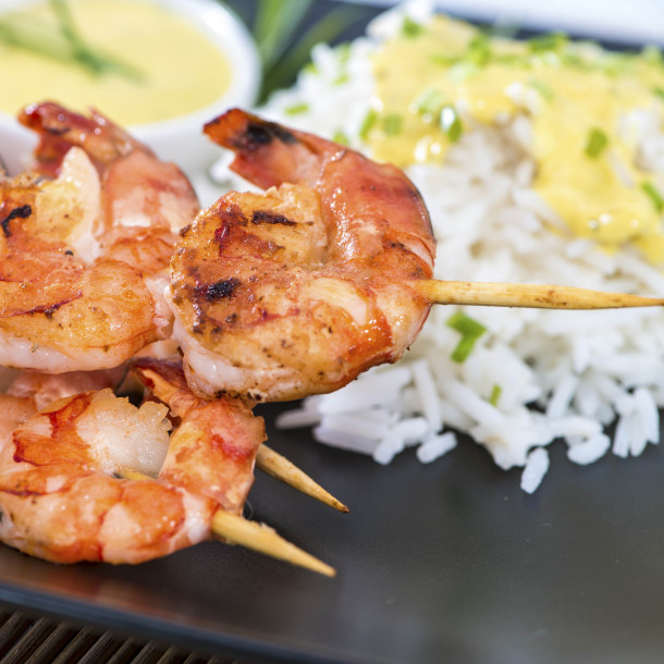 Sauté de gambas, curry et lait de coco