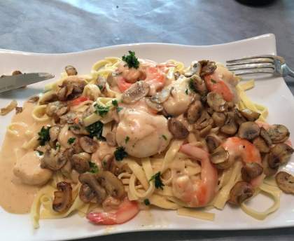 Scampis et noix de St Jacques au parmesan et martini blanc